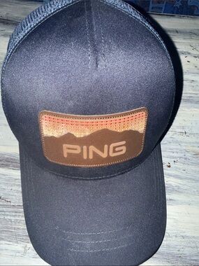 Ping Black Trucker Hat with Brown Patch and Sunset Accent